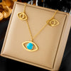 Wholesale Titanium Steel Facial Features Style Hollow Blue Turquoise Eye Pendant Necklace With Electroplating