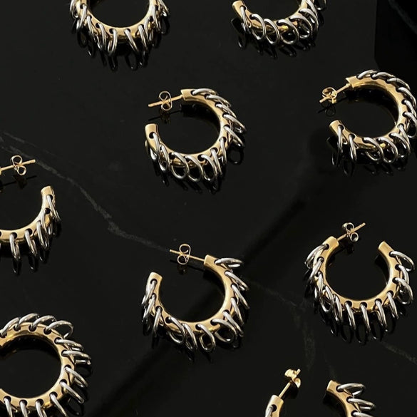 Wholesale Titanium Steel Flower Pattern Vintage Style Electroplated Earrings For Women