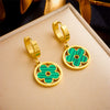 Wholesale Titanium Steel Geometric Hollow Flower Earrings With Electroplating For Women Simple Retro Style
