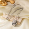 Wholesale Titanium Steel Geometric Oval Pendant Necklace With O Word Chain For Women