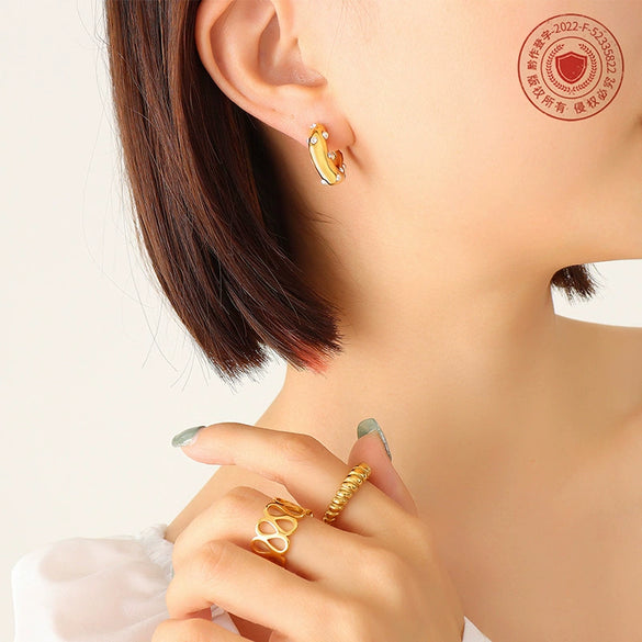 Wholesale Titanium Steel Goldplated Geometric Cshaped Earrings With Inlaid Imitation Pearl Zircon