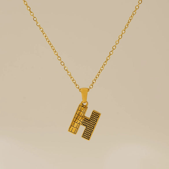 Wholesale Titanium Steel Goldplated Jewelry With Bark Pattern And English Letter Pendant Necklace Fashion Style Unisex