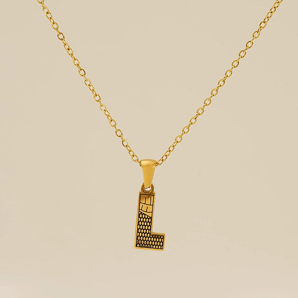 Wholesale Titanium Steel Goldplated Jewelry With Bark Pattern And English Letter Pendant Necklace Fashion Style Unisex
