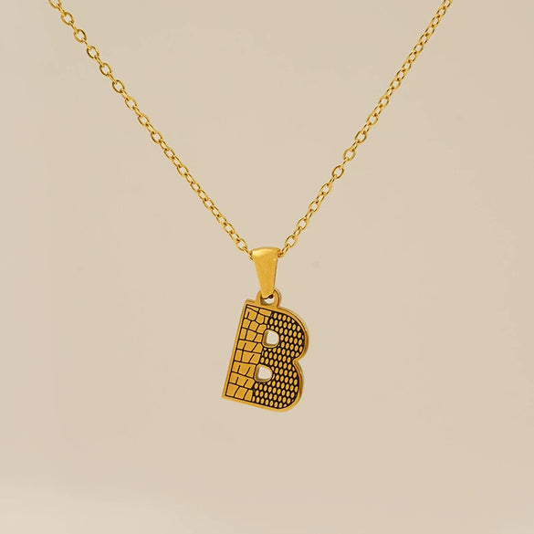 Wholesale Titanium Steel Goldplated Jewelry With Bark Pattern And English Letter Pendant Necklace Fashion Style Unisex