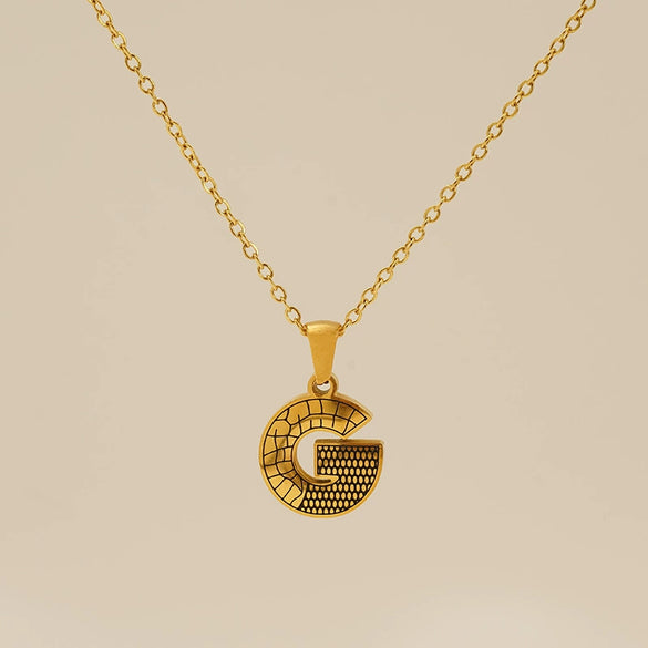 Wholesale Titanium Steel Goldplated Jewelry With Bark Pattern And English Letter Pendant Necklace Fashion Style Unisex