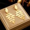 Wholesale Titanium Steel Goldplated Leaf Earrings Retro Elegant And Creative Design