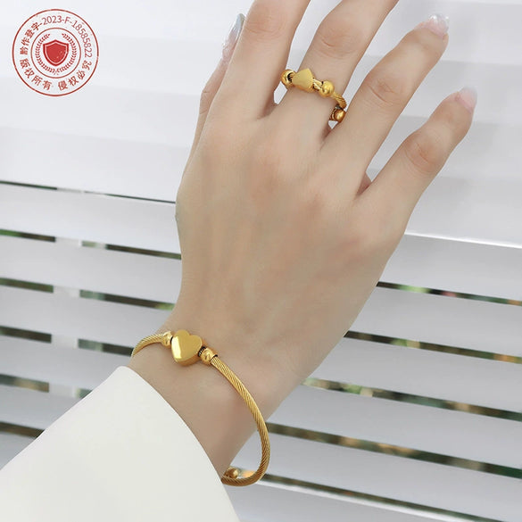 Wholesale Titanium Steel Goldplated Love Shape Jewelry Set Including Adjustable Coil Bracelet And Trendy Ring