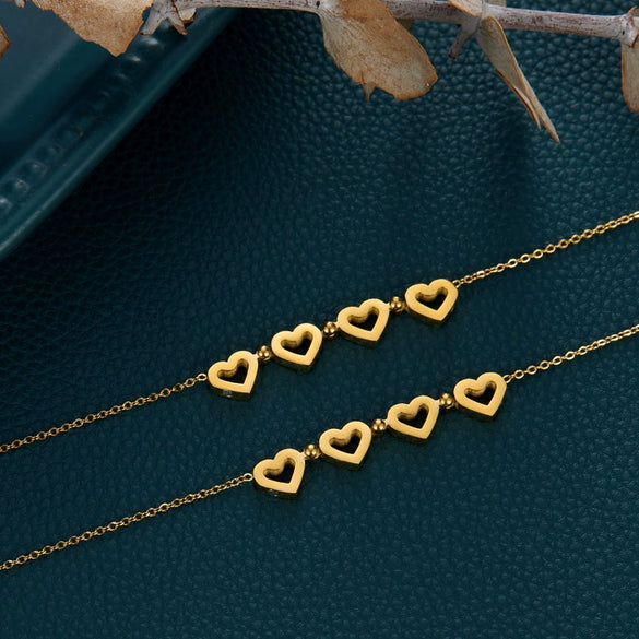 Wholesale Titanium Steel Heart Four Leaf Clover Magnetic Deformation Women's Necklace Electroplated 18K Gold Color Protected O Chain