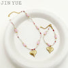 Wholesale Titanium Steel Heart Shape Embossed Necklace And Bracelet Set With Electroplating