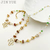 Wholesale Titanium Steel Irregular Hollow Flower Handmade Beaded Necklace And Bracelet Set With Electroplating For Women