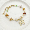Wholesale Titanium Steel Irregular Hollow Flower Handmade Beaded Necklace And Bracelet Set With Electroplating For Women