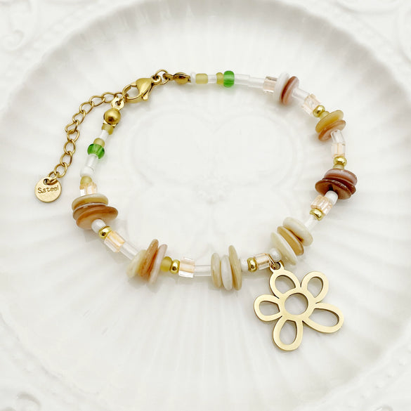 Wholesale Titanium Steel Irregular Hollow Flower Handmade Beaded Necklace And Bracelet Set With Electroplating For Women