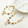 Wholesale Titanium Steel Irregular Hollow Flower Handmade Beaded Necklace And Bracelet Set With Electroplating For Women