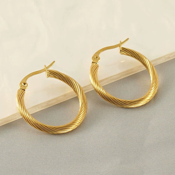 Wholesale Titanium Steel Women's Earrings With Geometric Spiral Pattern And Electroplating Treatment