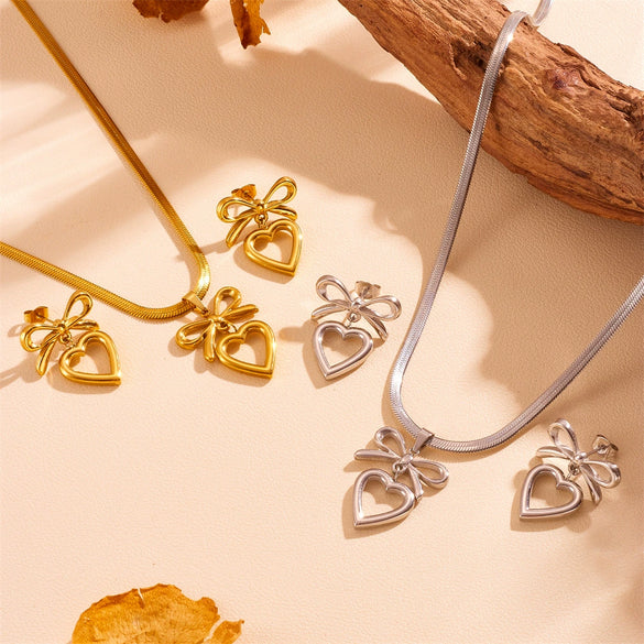Wholesale Titanium Steel Women's Earrings With Love Water Drops And Bell Patterns And Bow And Hollow Shapes