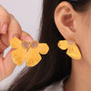Wholesale 316L Stainless Steel Women's Geometric Butterfly Shape Electroplated Earrings Inlaid With Cat's Eye Stone