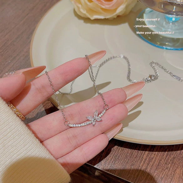 Wholesale Titanium Steel Zircon Inlaid Bow Pendant Necklace For Women