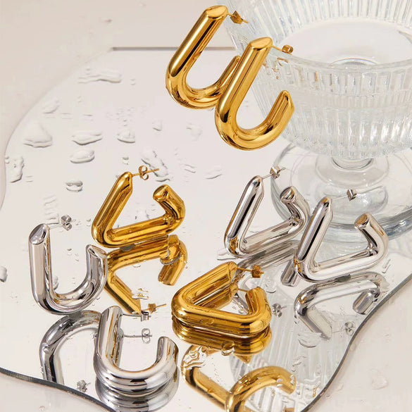 Wholesale Triangle Geometric Metal Hollow Stainless Steel Earrings With Pvd Vacuum Electroplating