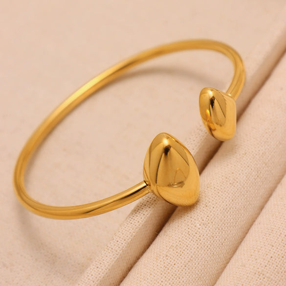 Wholesale Triangular Texture Hollow Elastic Bracelet Stainless Steel Material Plated With Real Gold
