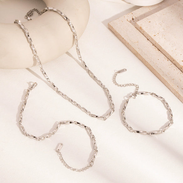 Wholesale Twist Chain Necklace Bracelet Anklet Suit In Stainless Steel With Geometric Style And Electric Polishing