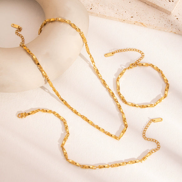 Wholesale Twisted Chain Necklace Bracelet Anklet Suit In Stainless Steel With Vacuum Real Gold Electroplating In Pvd Furnace For Women