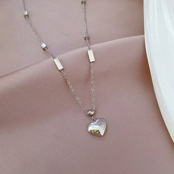 Wholesale Unisex Cartoon Geometric Electroplated Titanium Steel Heart Necklace