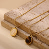 Wholesale Unisex Cross Chain Necklace With Gold Electroplated Stainless Steel Pendant And Tiger Eye Stone