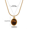 Wholesale Unisex Cross Chain Necklace With Gold Electroplated Stainless Steel Pendant And Tiger Eye Stone