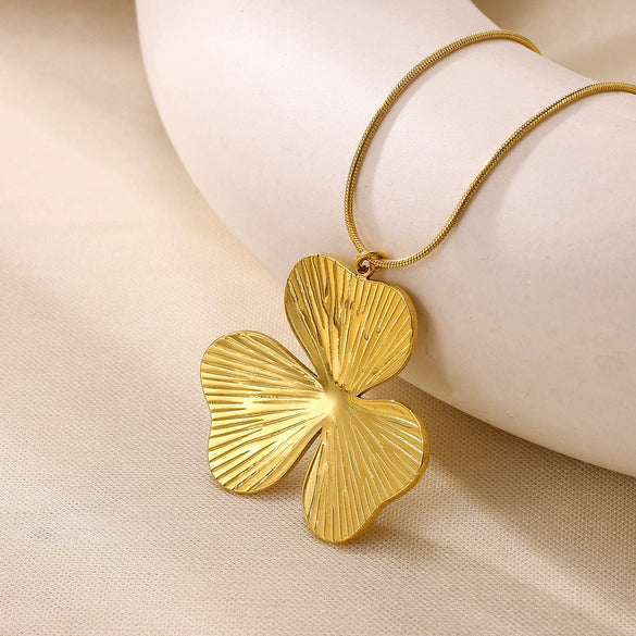Wholesale Unisex Electroplated Gold Titanium Steel And Stainless Steel Exaggerated Flower Leaf Necklace Pendant With Cross Chain