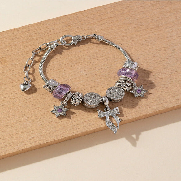 Wholesale Unisex Fashion Copper Alloy Bracelet With Electroplated Flower Bow Geometric Pendant