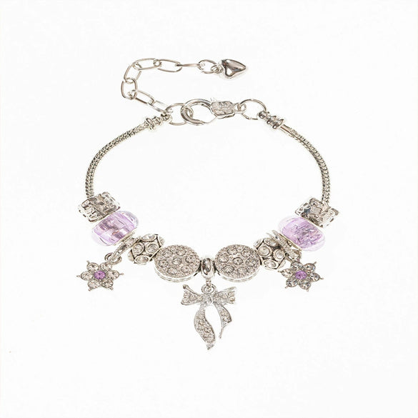 Wholesale Unisex Fashion Copper Alloy Bracelet With Electroplated Flower Bow Geometric Pendant