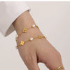 Wholesale Unisex Ferris Wheel Four Leaf Flower Electroplated Titanium Steel Necklace And Bracelet Jewelry