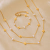 Wholesale Unisex Ferris Wheel Four Leaf Flower Electroplated Titanium Steel Necklace And Bracelet Jewelry