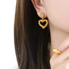 Wholesale Unisex Geometric Hollow Love Design Goldplated Titanium Steel Stud Earrings