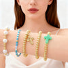 Wholesale Unisex Geometric Pattern Goldplated Copper Beaded Bracelet With Cross Pendant