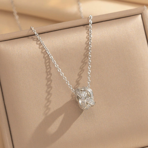 Wholesale Unisex Light Luxury Round Copper Zircon Real Gold Plated Cross Chain Pendant Necklace With Intertwined Love Knot Design