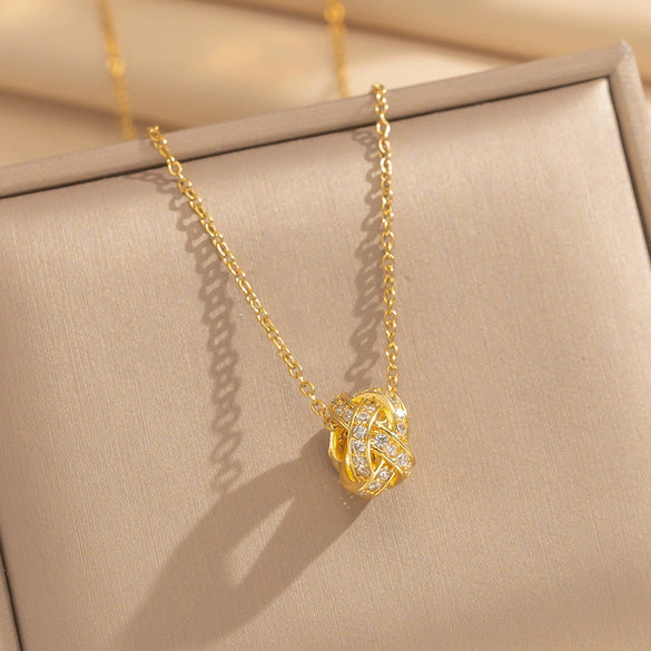 Wholesale Unisex Light Luxury Round Copper Zircon Real Gold Plated Cross Chain Pendant Necklace With Intertwined Love Knot Design