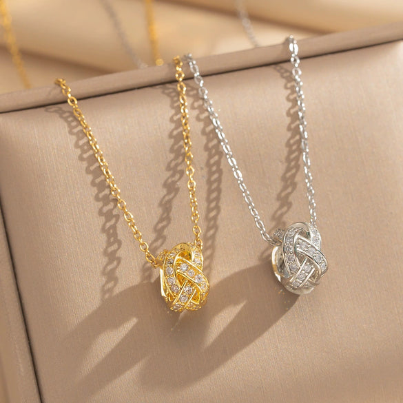 Wholesale Unisex Light Luxury Round Copper Zircon Real Gold Plated Cross Chain Pendant Necklace With Intertwined Love Knot Design