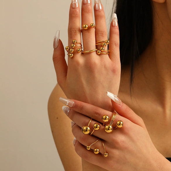 Wholesale Unisex Minimalist Design Asymmetric Stainless Steel Ring With Geometric Steel Balls And 18K Furnace Vacuum Plating