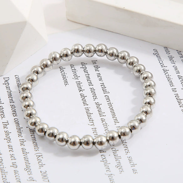 Wholesale Unisex Retro Simple Alloy Round Bead Elastic Bracelet With Electrophoresis Gold Treatment