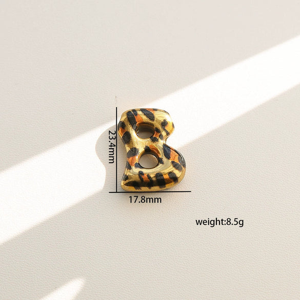 Wholesale Unisex Stainless Steel Electroplated Leopard Print Letter Pendant Cross Chain Necklace