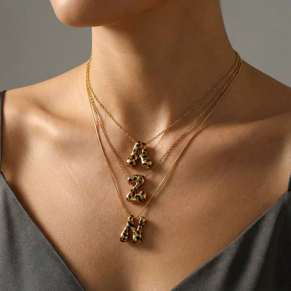 Wholesale Unisex Stainless Steel Electroplated Leopard Print Letter Pendant Cross Chain Necklace