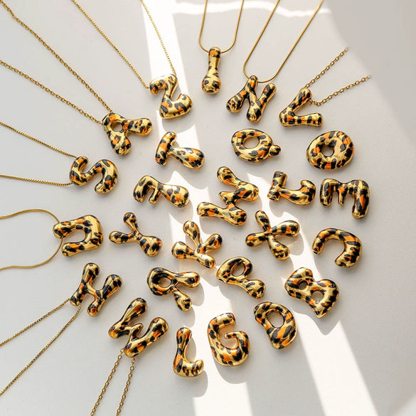Wholesale Unisex Stainless Steel Electroplated Leopard Print Letter Pendant Cross Chain Necklace