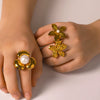 Wholesale Unisex Stainless Steel Flower Pearl Ring With Geometric Pattern And 18K Furnace Vacuum Plating