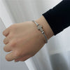 Wholesale Unisex Titanium Steel Geometric Cross Opening Adjustable Bracelet With Electroplating