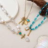 Wholesale Unisex Titanium Steel Zircon Small Fish Pearl Pendant Necklace And Earrings In Baroque And Minimalist Style