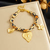 Wholesale Vintage Printed Stainless Steel Goldplated Irregular Heartshaped Flower Pendant Bracelet For Women