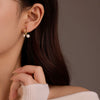 Wholesale Vintage Stainless Steel Knot Pendant Pearl Earrings With Electroplating For Women