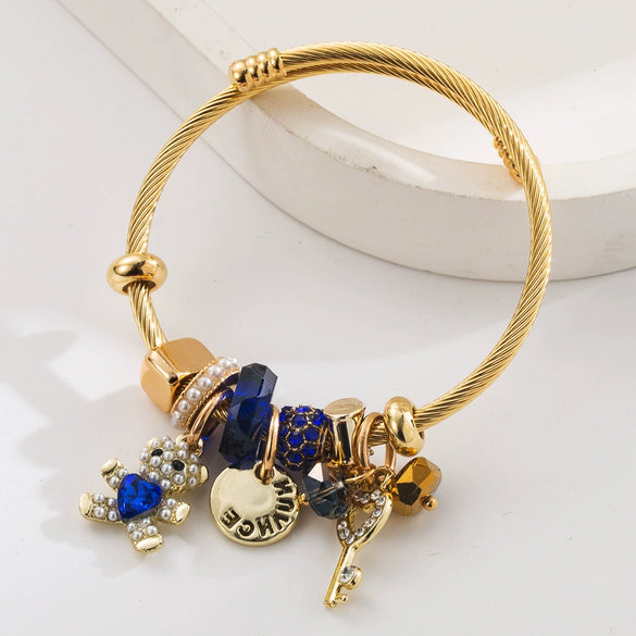 Wholesale Women's Alloy And Titanium Steel Bracelet With Bear Key Crystal Pendant