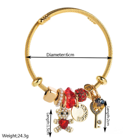 Wholesale Women's Alloy And Titanium Steel Bracelet With Bear Key Crystal Pendant